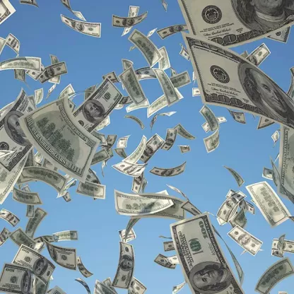 Dollar bills falling from sky